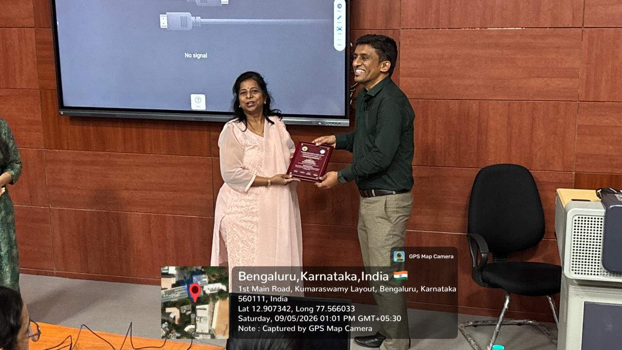 Presentation of plaque to guest speaker by Dr. Shobha E.S.